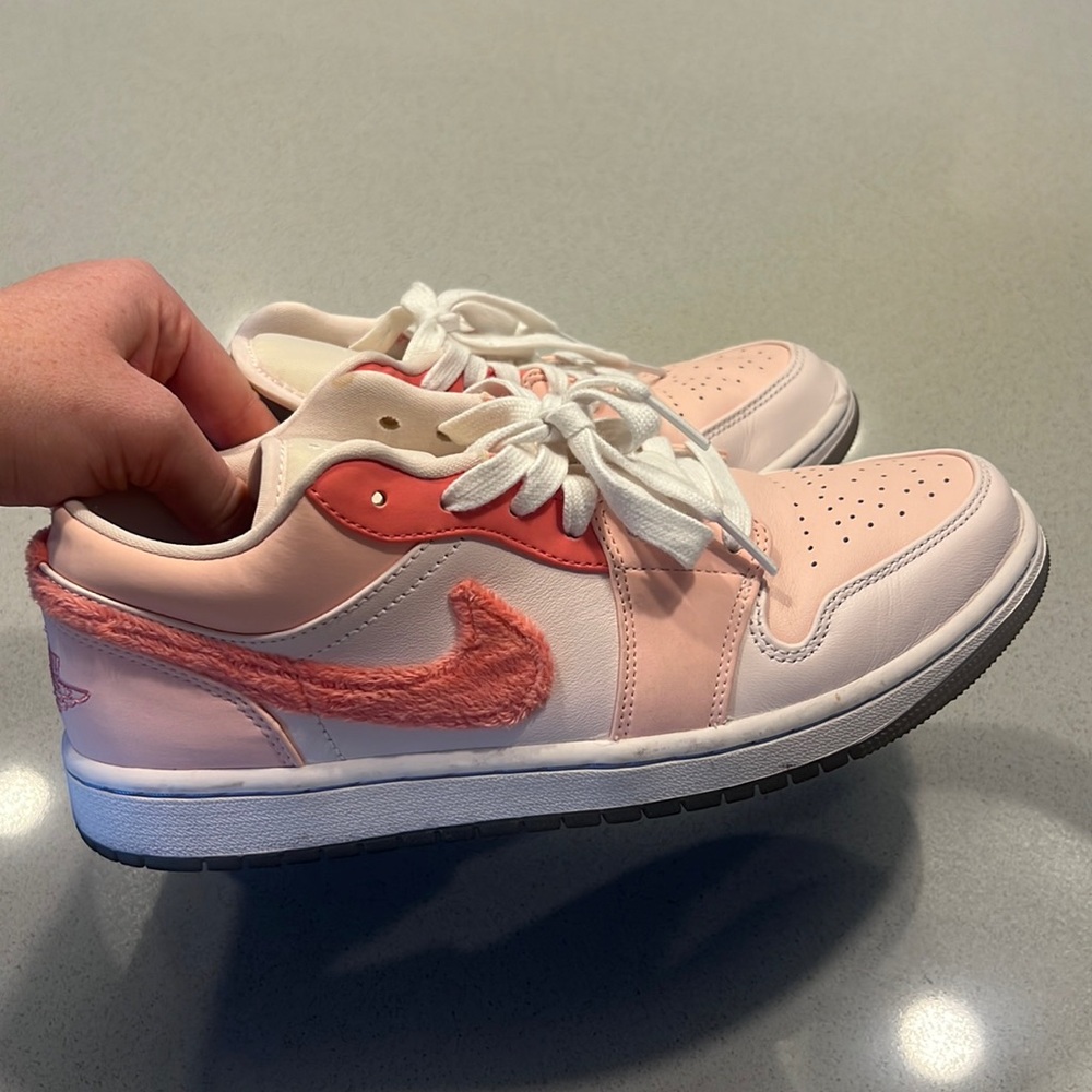 Pink with fuzzy Nike sign Jordan 1 low